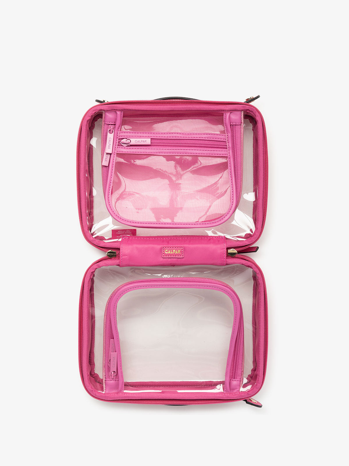 CALPAK clear skincare bag with multiple zippered compartments in dragonfruit pink; CMM2201-DRAGONFRUIT