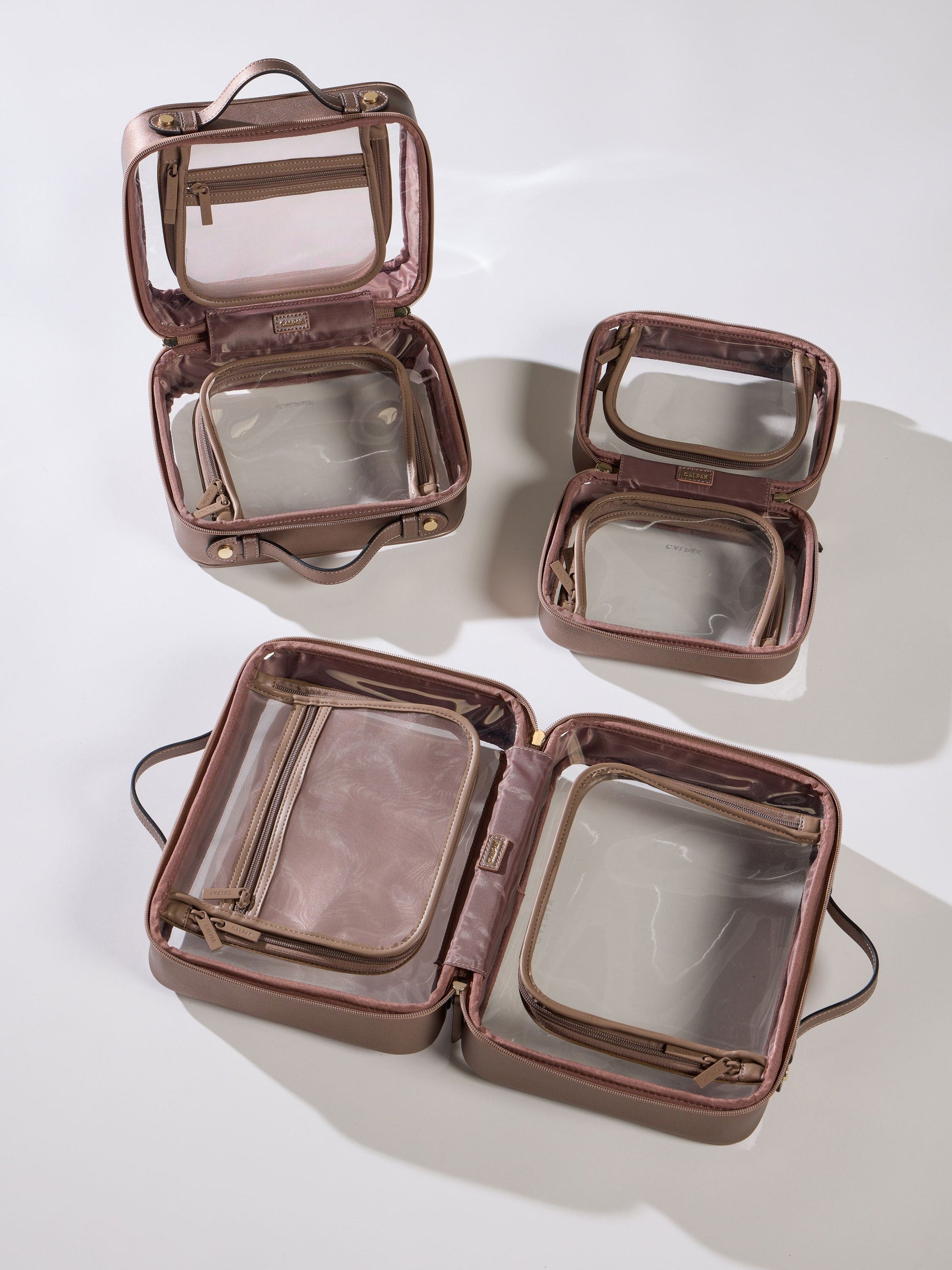 CALPAK Clear Cosmetic Cases in all size offerings in metallic bronze; CCM2001-BRONZE