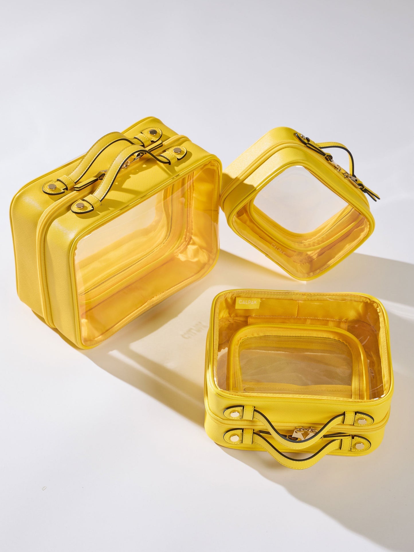 Yellow sturdy Clear Cosmetic Cases in small, medium and large offerings; CCM2001-LEMON